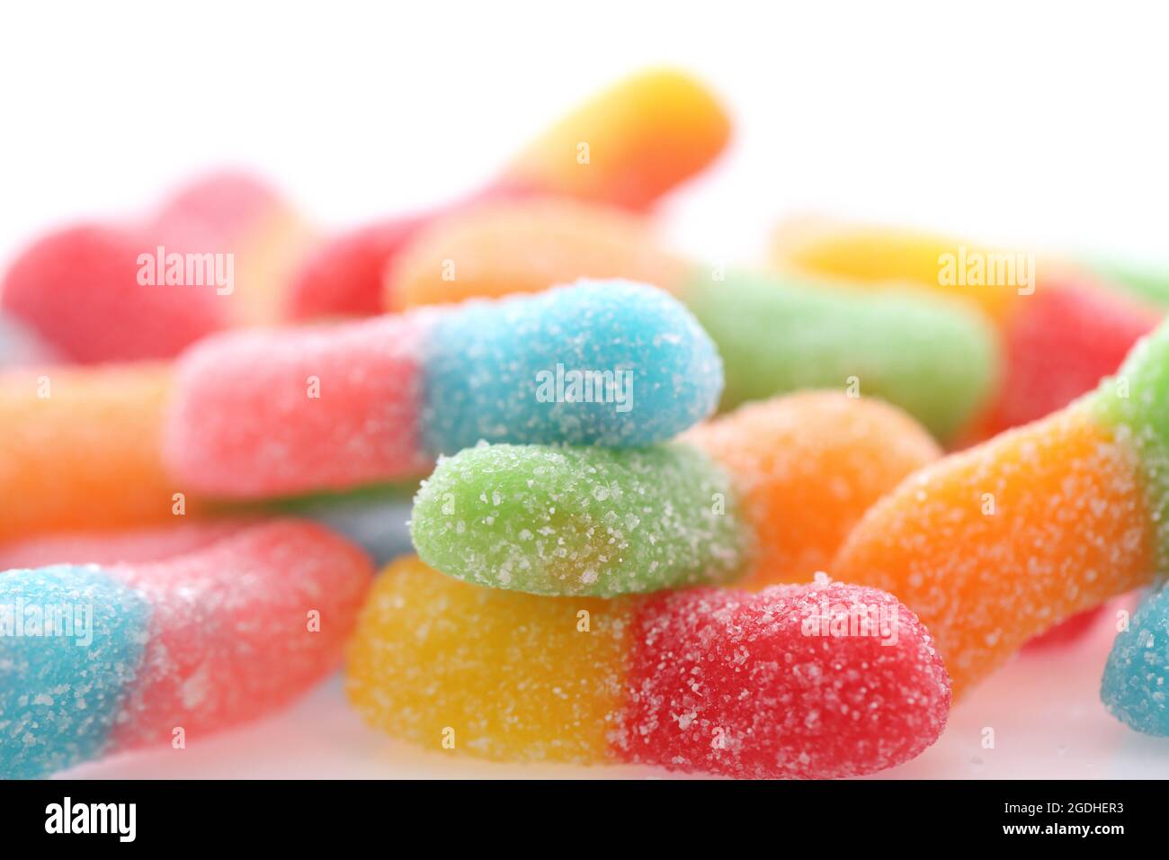 Colorful gummy jelly sugar candies close up isolated in white ...