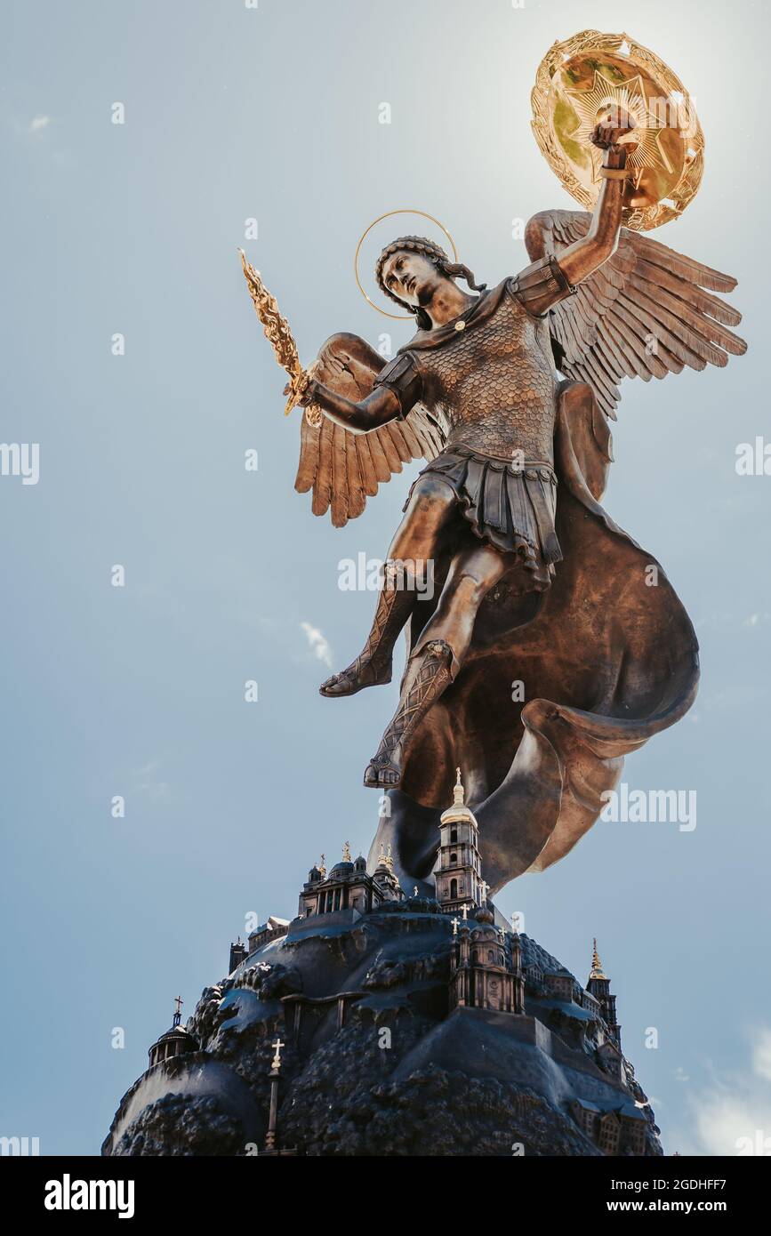 KIEV, UKRAINE Jun 13, 2021 The statue of Angel protector of Kiev Ukraine under the cloudy sky