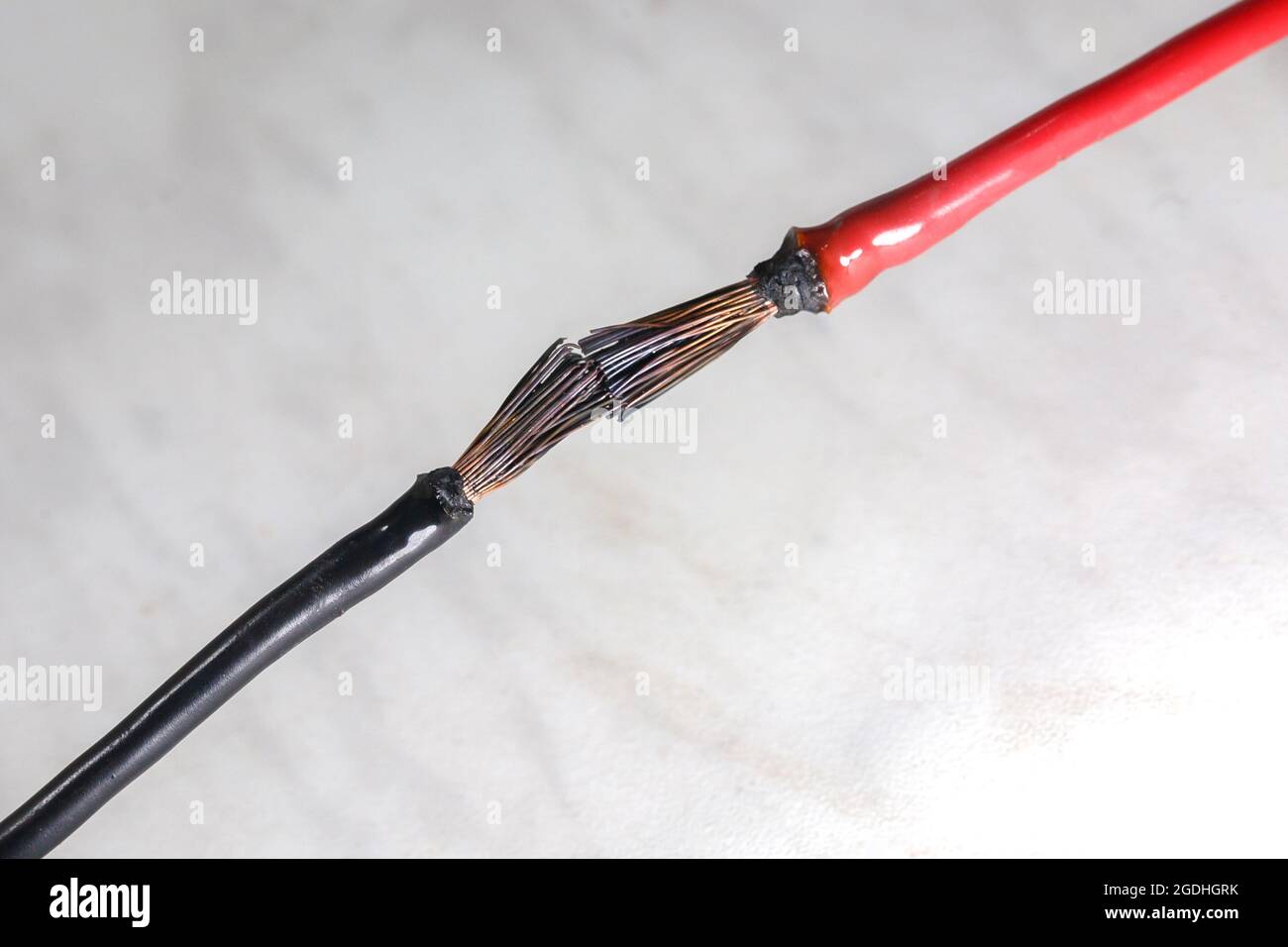 Short circuit of electrical wires sparks molten wires, fire from