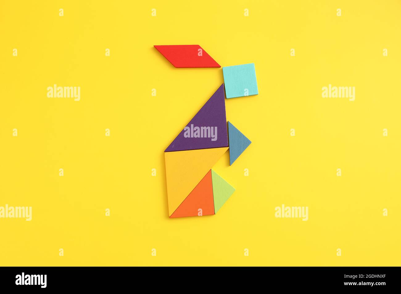 Wooden blocks rabbit isolated in yellow background Stock Photo - Alamy