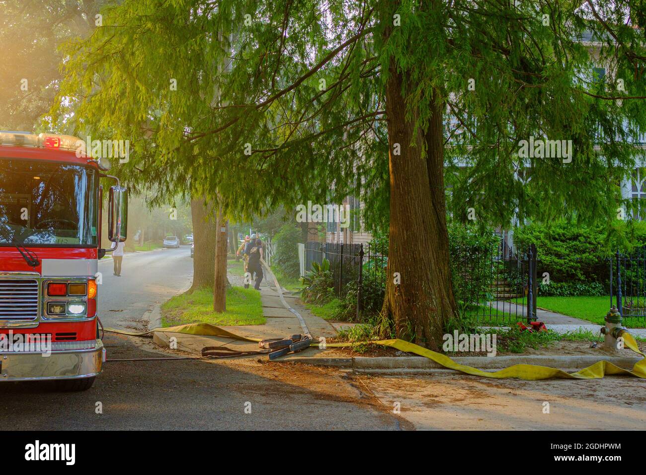 NEW ORLEANS, LA, USA AUGUST 4, 2021 Fire fighters and truck