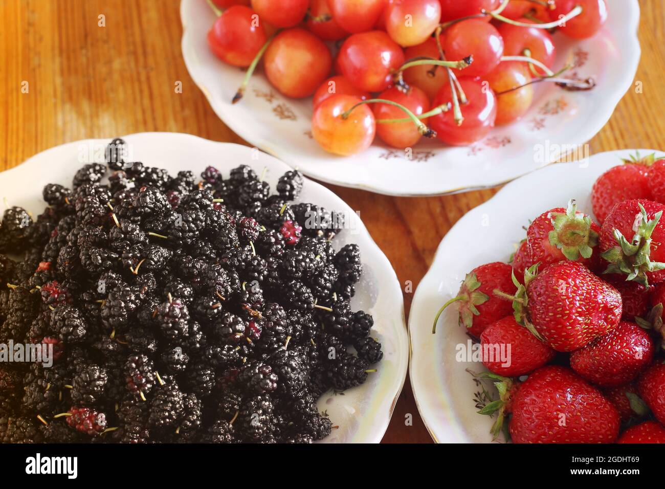 Berries. Strawberry, cherry and mulberry Stock Photo Alamy