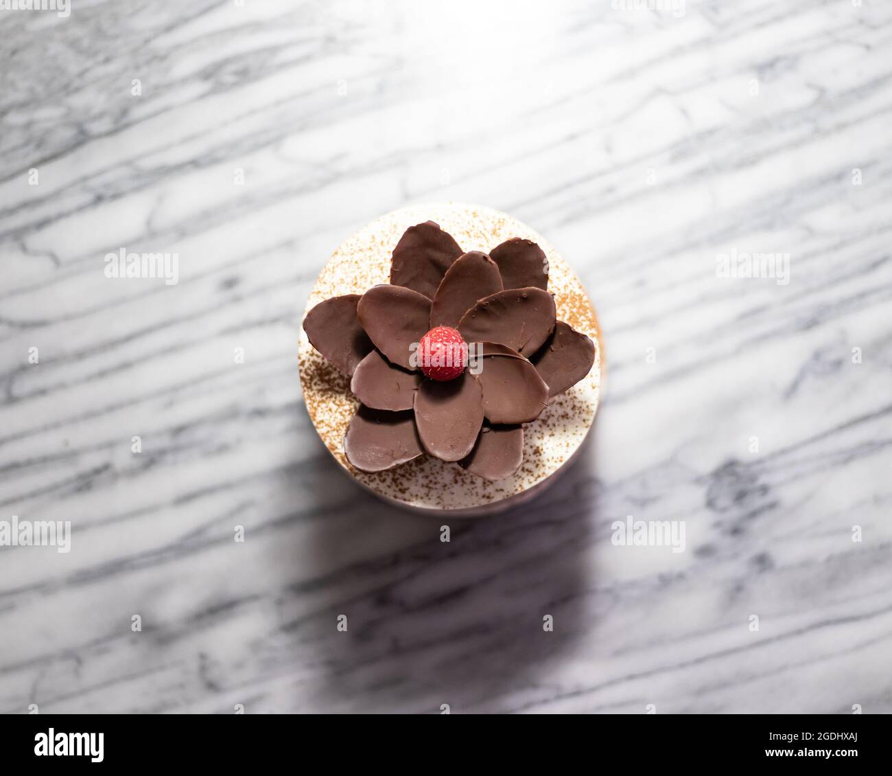 Chocolate Lotus Flower on Tiramisu Cake Stock Photo Alamy