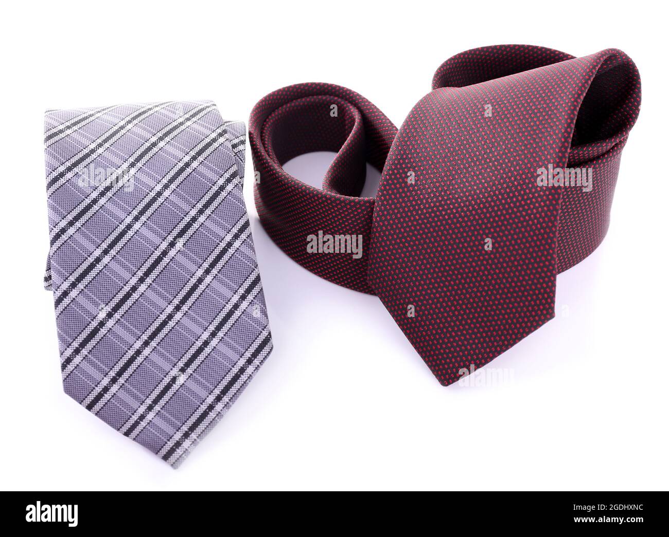 Brown and grey ties on white background isolated Stock Photo - Alamy