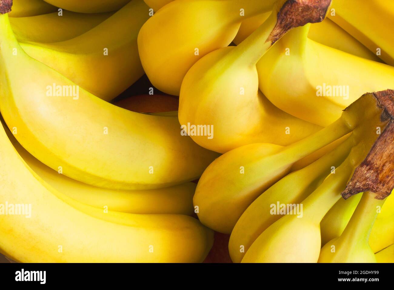 Yellow banana. Background of bananas. Fruits. Food background Stock Photo Alamy