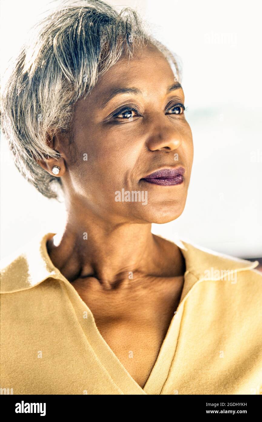 Mature african american woman with short hair hi-res stock photography ...