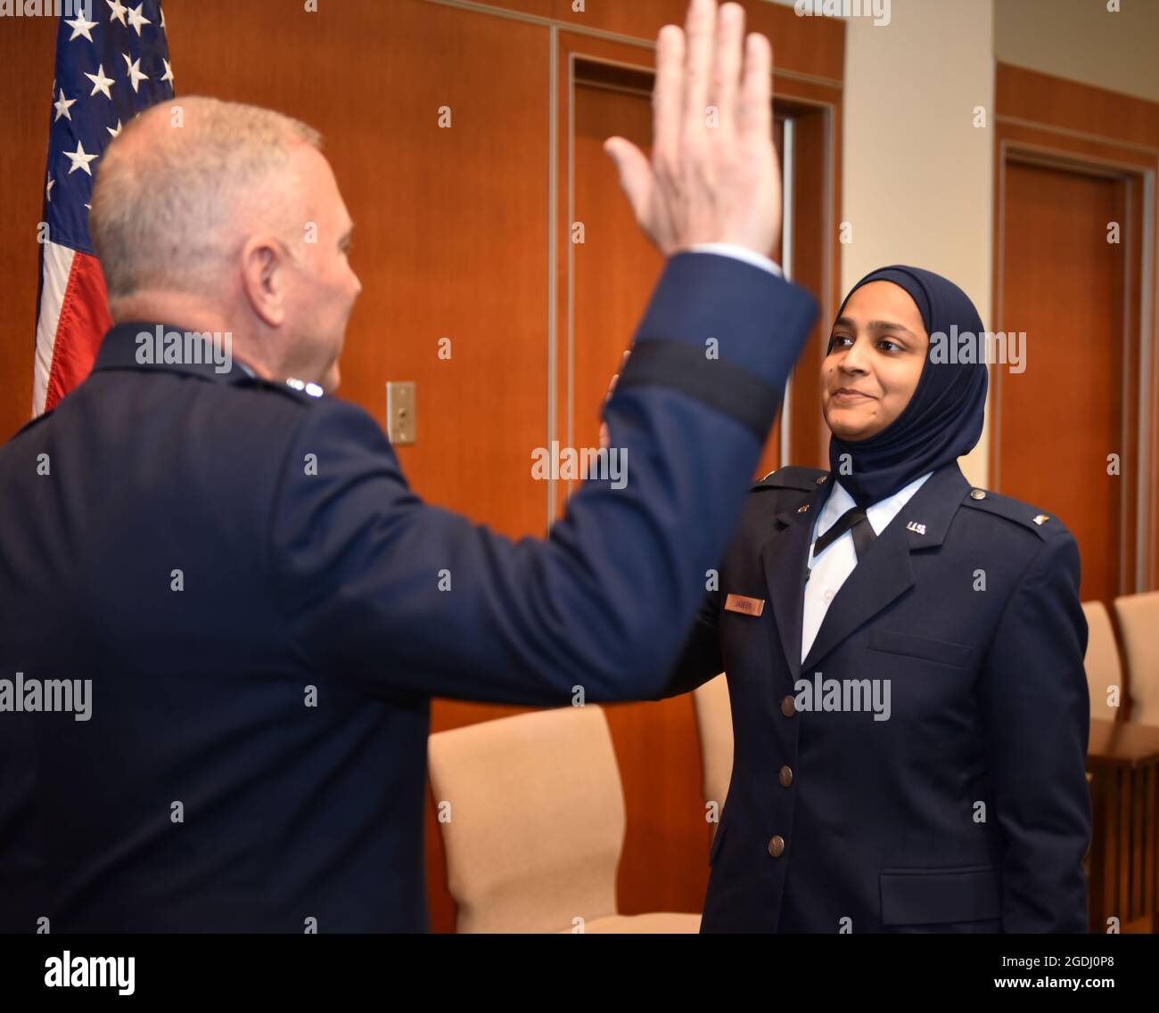 U.S. Air Force Chaplain Candidate Saleha Jabeen is commissioned by U.S. Air Force Chief of Chaplains (Maj. Gen.) Steven Schaick, Dec. 18, 2019 at the Catholic Theological Union, Chicago, Illinois. Jabeen is the first female Muslim Chaplain in the Air Force and Department of Defense. (U.S. Air Force photo/ Tech. Sgt. Armando A. Schwier-Morales) Stock Photo