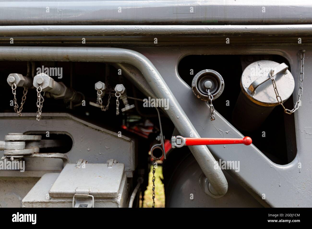 A red lever on a grey historic railway Stock Photo - Alamy