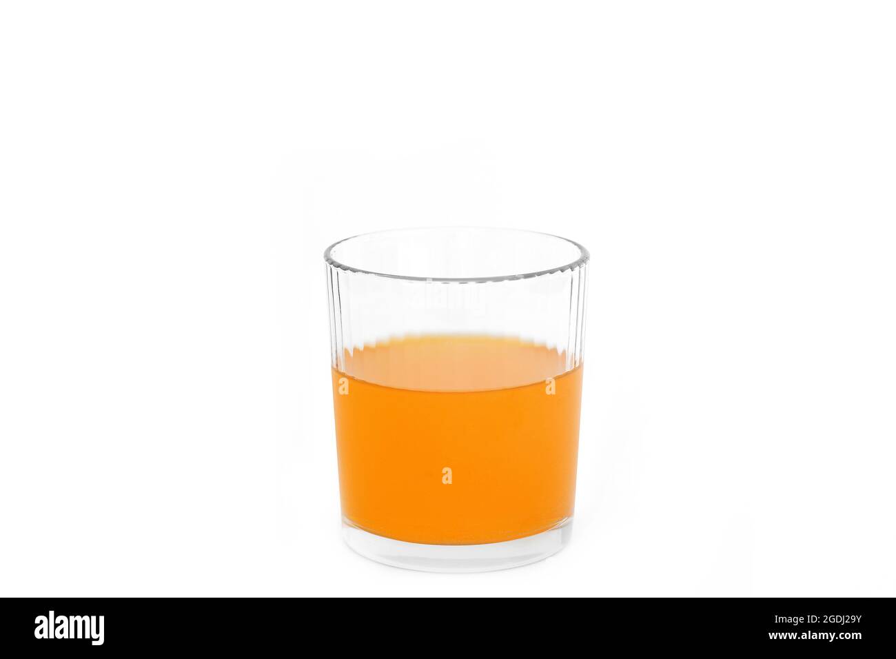 A healthy drink. A harmful drink. Drinks on a white background. Water. Fanta. Stock Photo