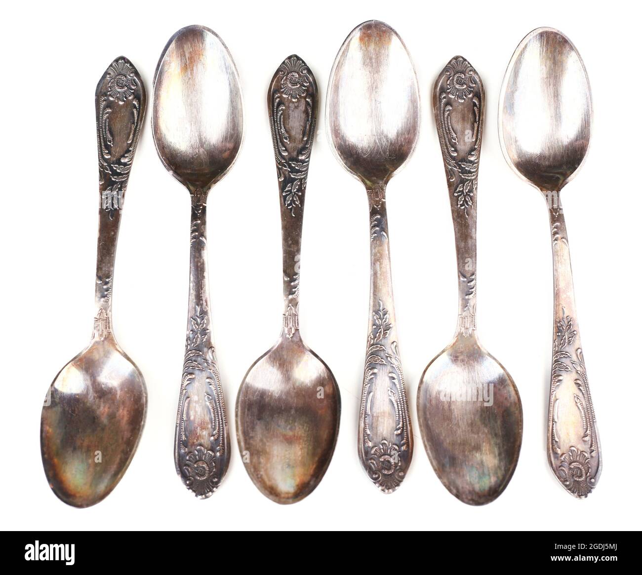 Old vintage spoons, isolated on white Stock Photo Alamy