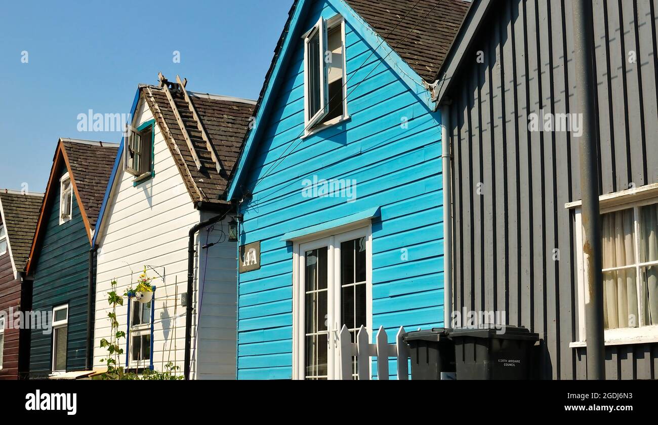 A row of colourful wooden houses in Lamlash, Isle of Arran, Scotland