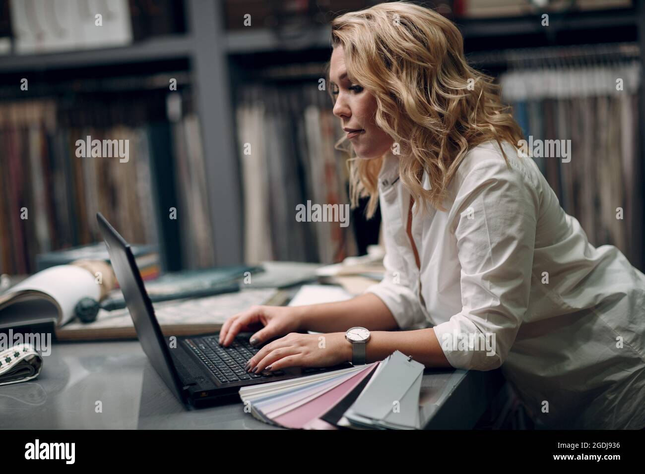 Interior design concept. Designer with laptop and project Stock Photo ...