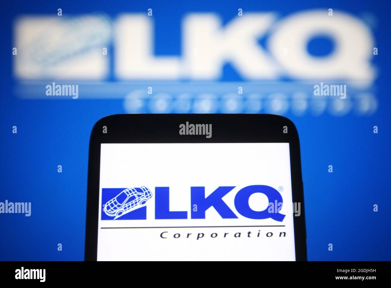 In this photo illustration a LKQ Corporation logo is seen on a