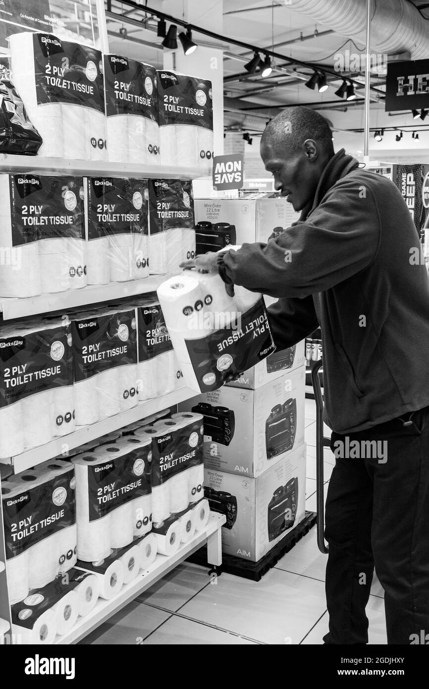 Supermarket packing shelves Black and White Stock Photos & Images Alamy