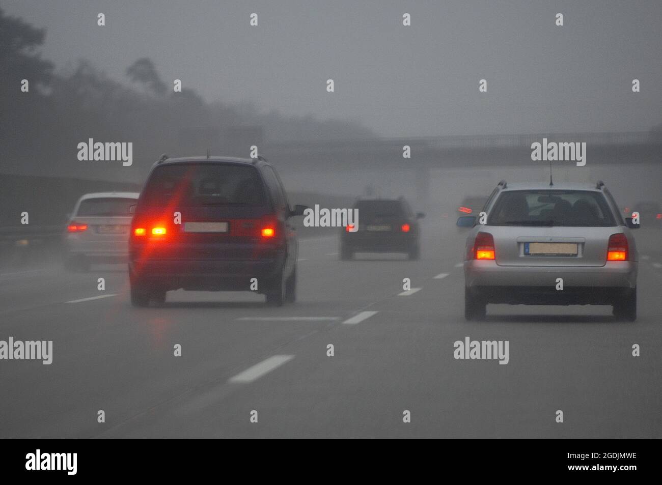 poor visibility on the motorway, rear fog light, Germany Stock Photo