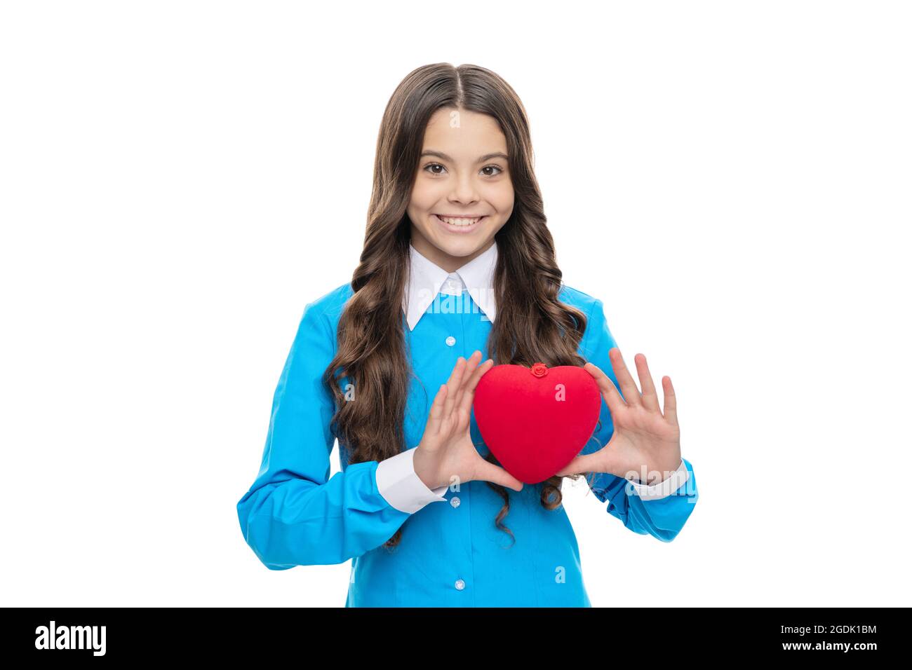 Happy girl hold big soft red heart isolated on white, heartbeat Stock Photo