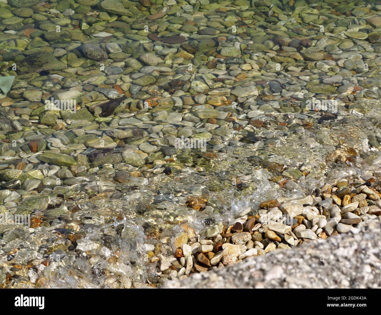 Crystal clear waters in Kassiopi, Corfu, Greece Stock Photo