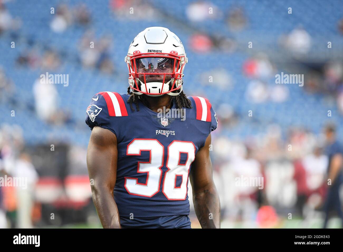 New England Patriots running back Rhamondre Stevenson (38) warms