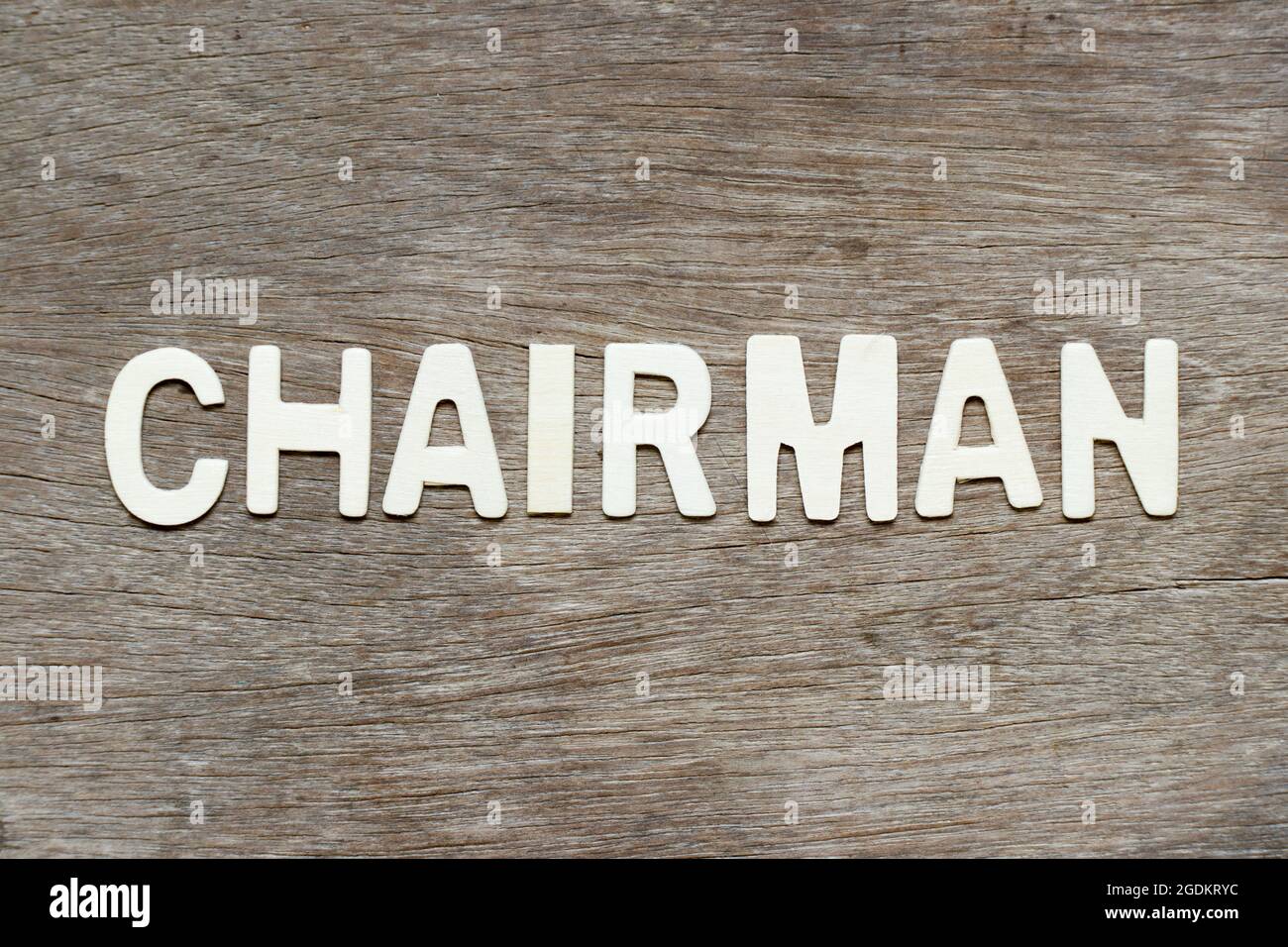 Alphabet letter in word chairman on wood background Stock Photo Alamy