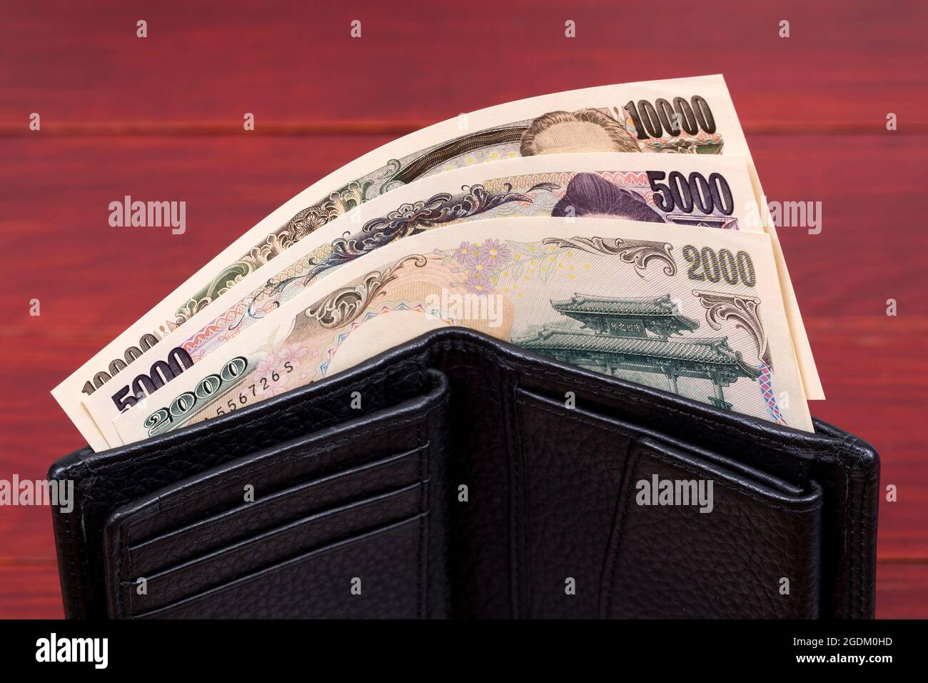 Japanese money yen in the black wallet Stock Photo Alamy