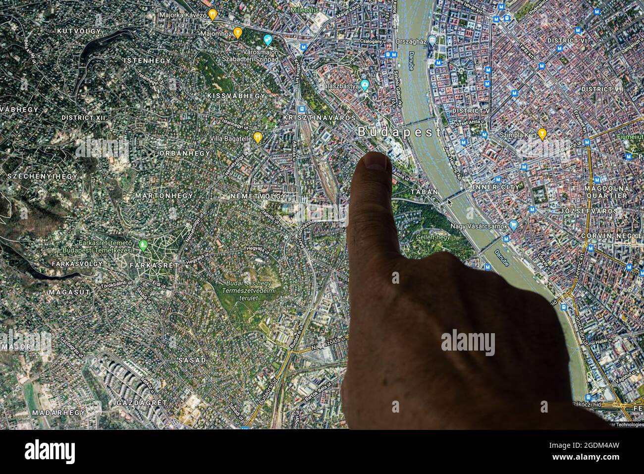 Satellite View Of Ahmedabad Udine, Italy. August 21, 2021. The Gooble Maps Satellite View Of Budapest,  Capital Of Hungary, Indicated With A Finger Stock Photo - Alamy