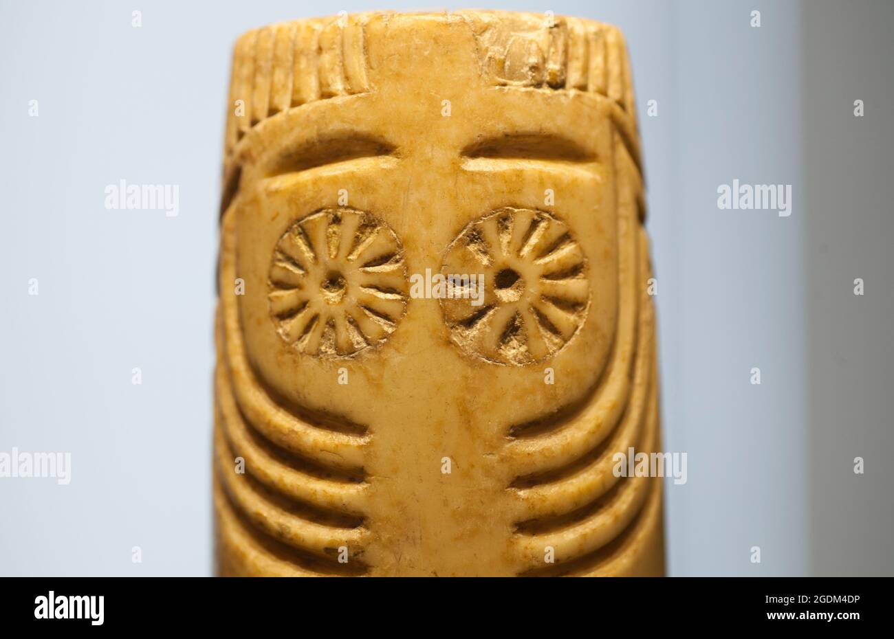 Madrid, Spain - Marh 6th 2021: Extremaduran eyed idol. Prehistorical sculpture from Chalcolithic period. National Archeological  Museum of Madrid Stock Photo