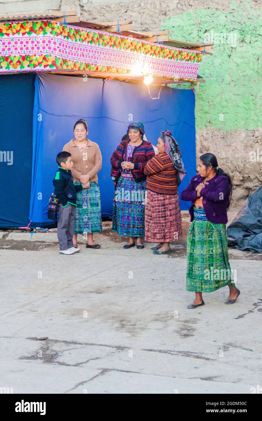SAN MATEO IXTATAN, GUATEMALA, MARCH 19, 2016: Local indigenous women on a street in San Mateo Ixtatan village. Stock Photo