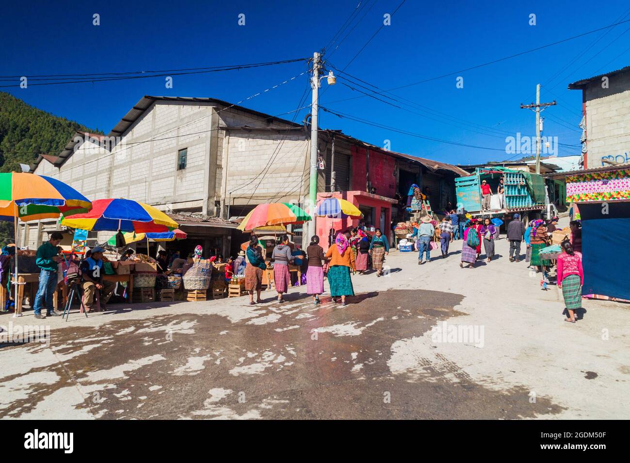 SAN MATEO IXTATAN, GUATEMALA, MARCH 19, 2016: Local indigenous people on a street in San Mateo Ixtatan village. Stock Photo