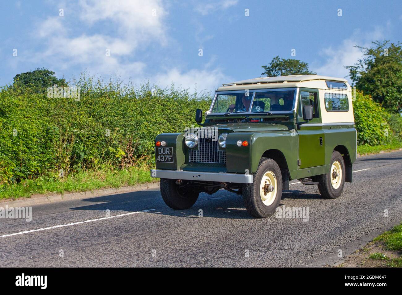 1968 60s sixties green Series IIA British Land Rover Series IIA 2286cc SWB 90 en-route to Capesthorne Hall classic July car show, Cheshire, UK Stock Photo