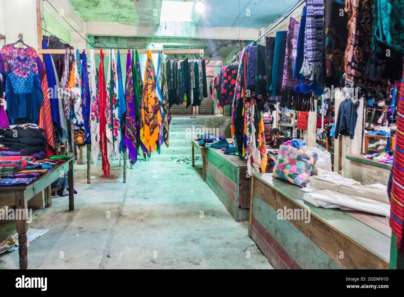 SAN MATEO IXTATAN, GUATEMALA, MARCH 19, 2016: Clothes stalls on a market in San Mateo Ixtatan village. Stock Photo
