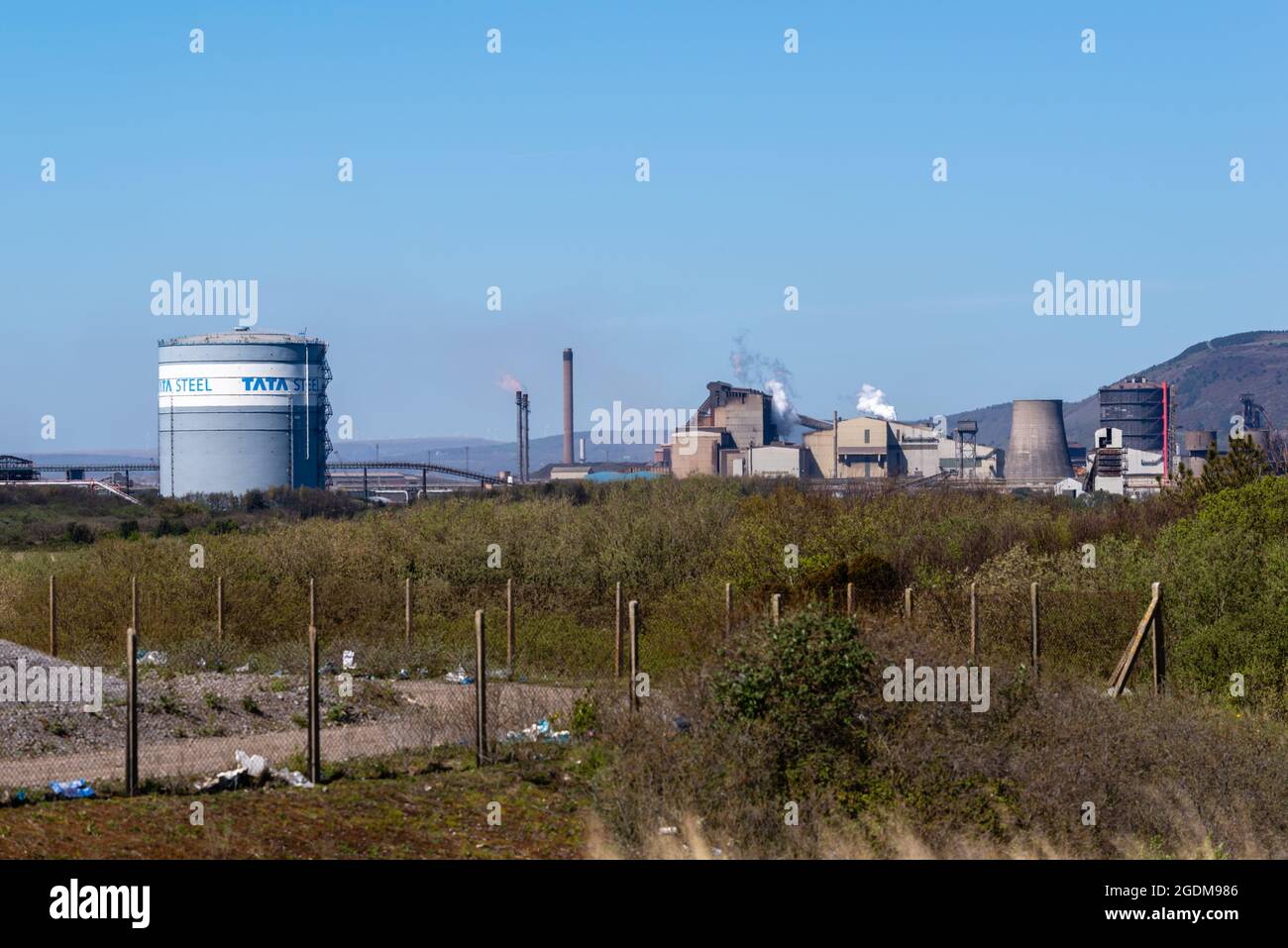 Port Talbot (Tata) steel works with scub land in foreground Stock Photo