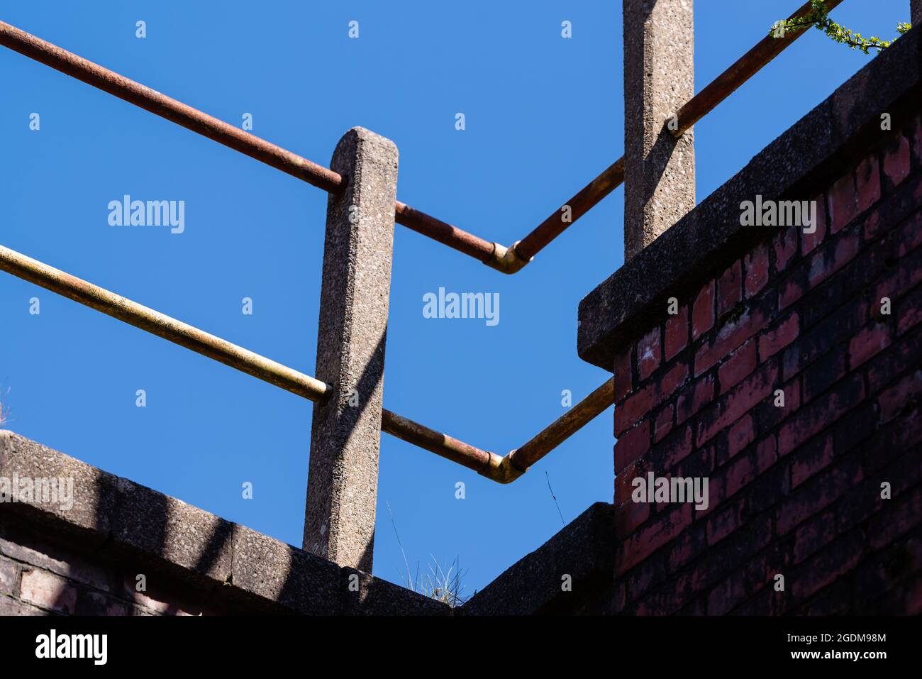 Railings and concrete posts on top of a railway bridge Stock Photo Alamy