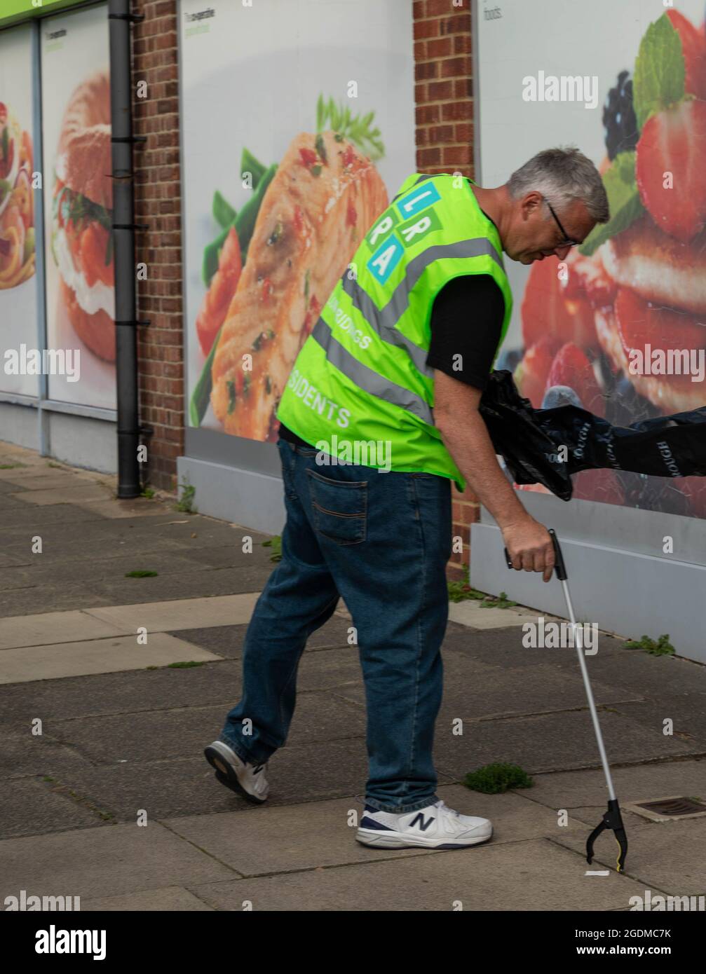 Brentwood, UK. 14th Aug, 2021. Hutton Essex 14th August 2021 The 'Keep Hutton and Shenfield tidy' group took part in a community litter pick day in Hutton Essex led by the local Councillor Keith Barber Credit: Ian Davidson/Alamy Live News Stock Photo