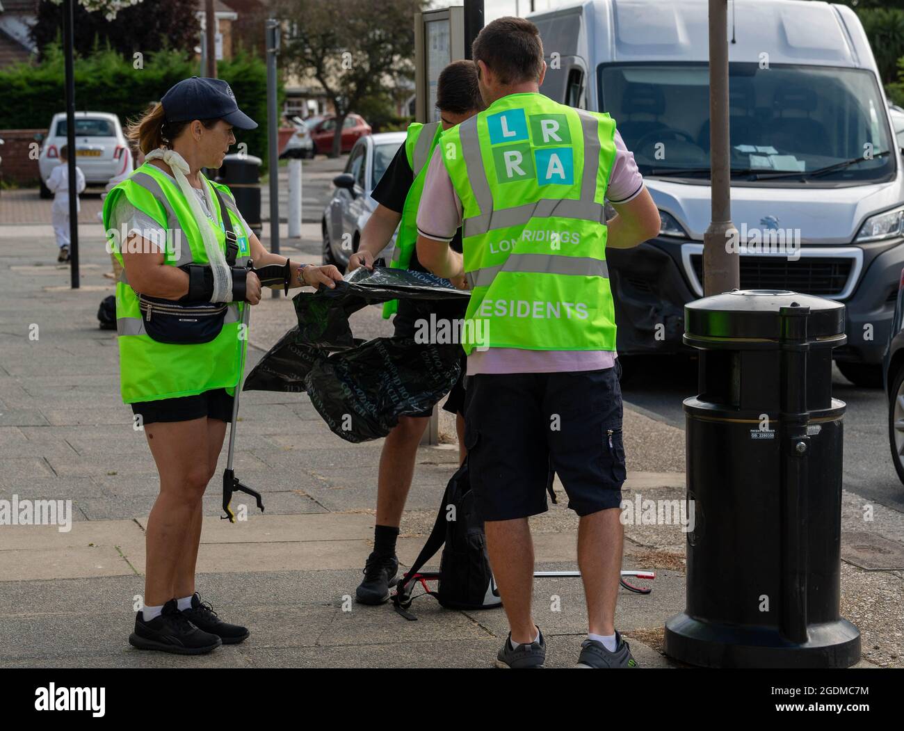 Brentwood, UK. 14th Aug, 2021. Hutton Essex 14th August 2021 The 'Keep Hutton and Shenfield tidy' group took part in a community litter pick day in Hutton Essex led by the local Councillor Keith Barber Credit: Ian Davidson/Alamy Live News Stock Photo