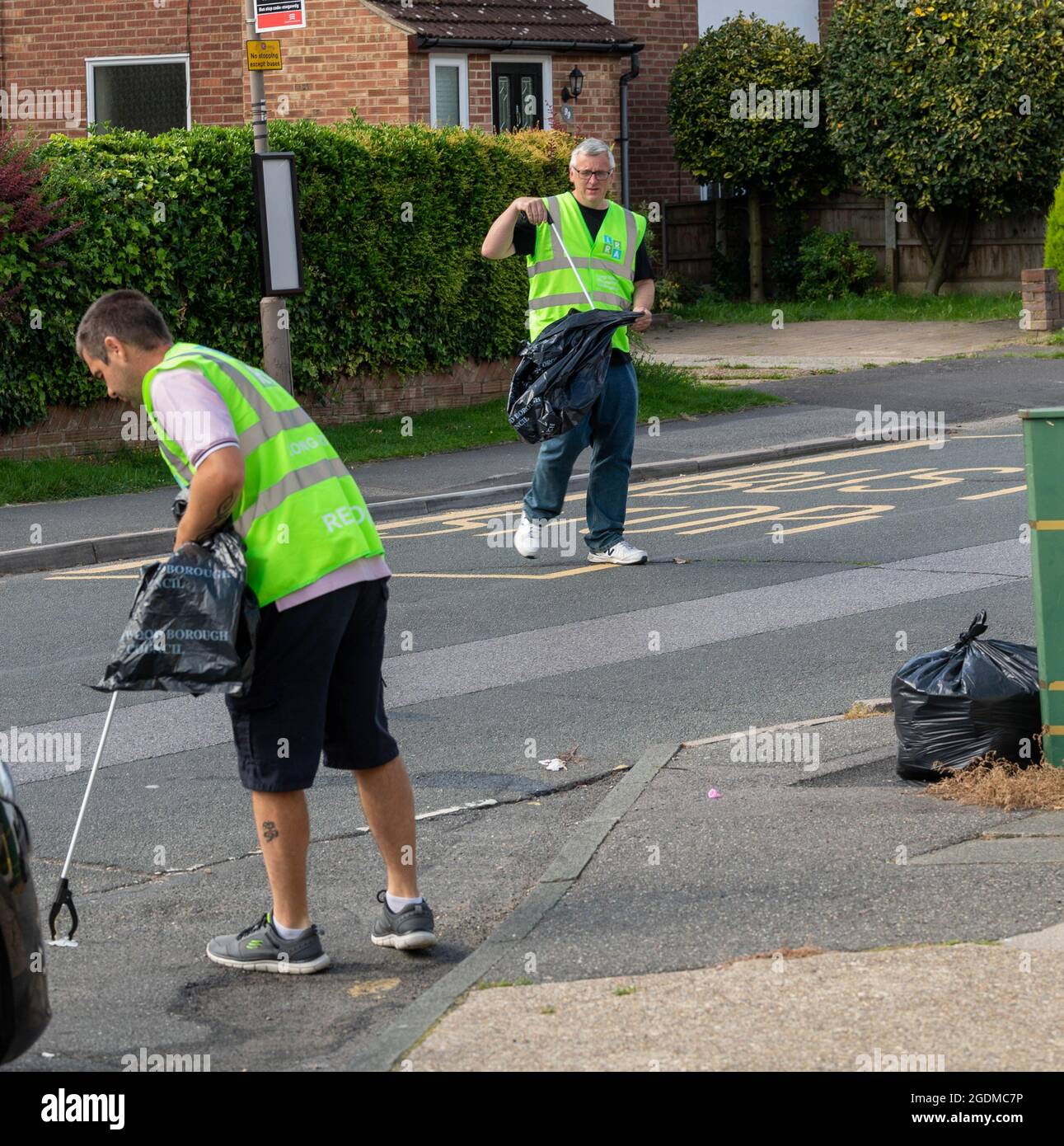 Brentwood, UK. 14th Aug, 2021. Hutton Essex 14th August 2021 The 'Keep Hutton and Shenfield tidy' group took part in a community litter pick day in Hutton Essex led by the local Councillor Keith Barber Credit: Ian Davidson/Alamy Live News Stock Photo