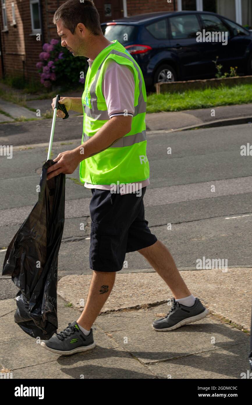 Brentwood, UK. 14th Aug, 2021. Hutton Essex 14th August 2021 The 'Keep Hutton and Shenfield tidy' group took part in a community litter pick day in Hutton Essex led by the local Councillor Keith Barber Credit: Ian Davidson/Alamy Live News Stock Photo