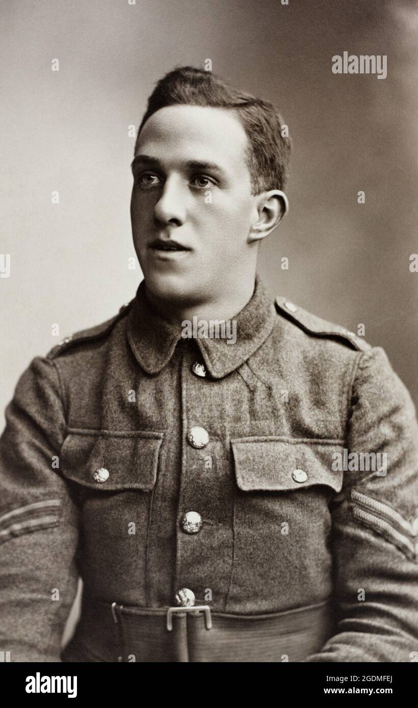 A portrait of a First World War British soldier, a Corporal, sitting. His tunic has General Service Corps buttons. Stock Photo