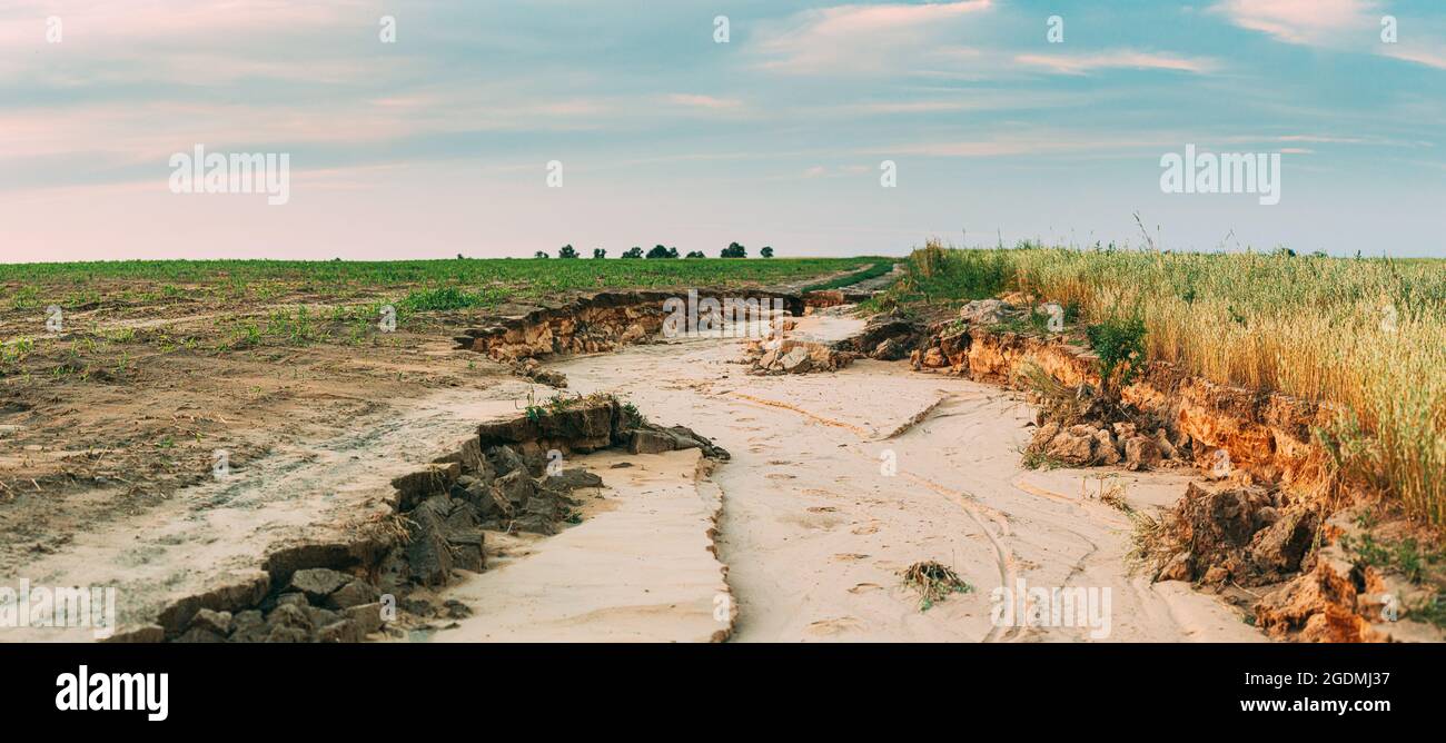 Country Road Washed Out After Heavy Rains On Field. Summer Field ...