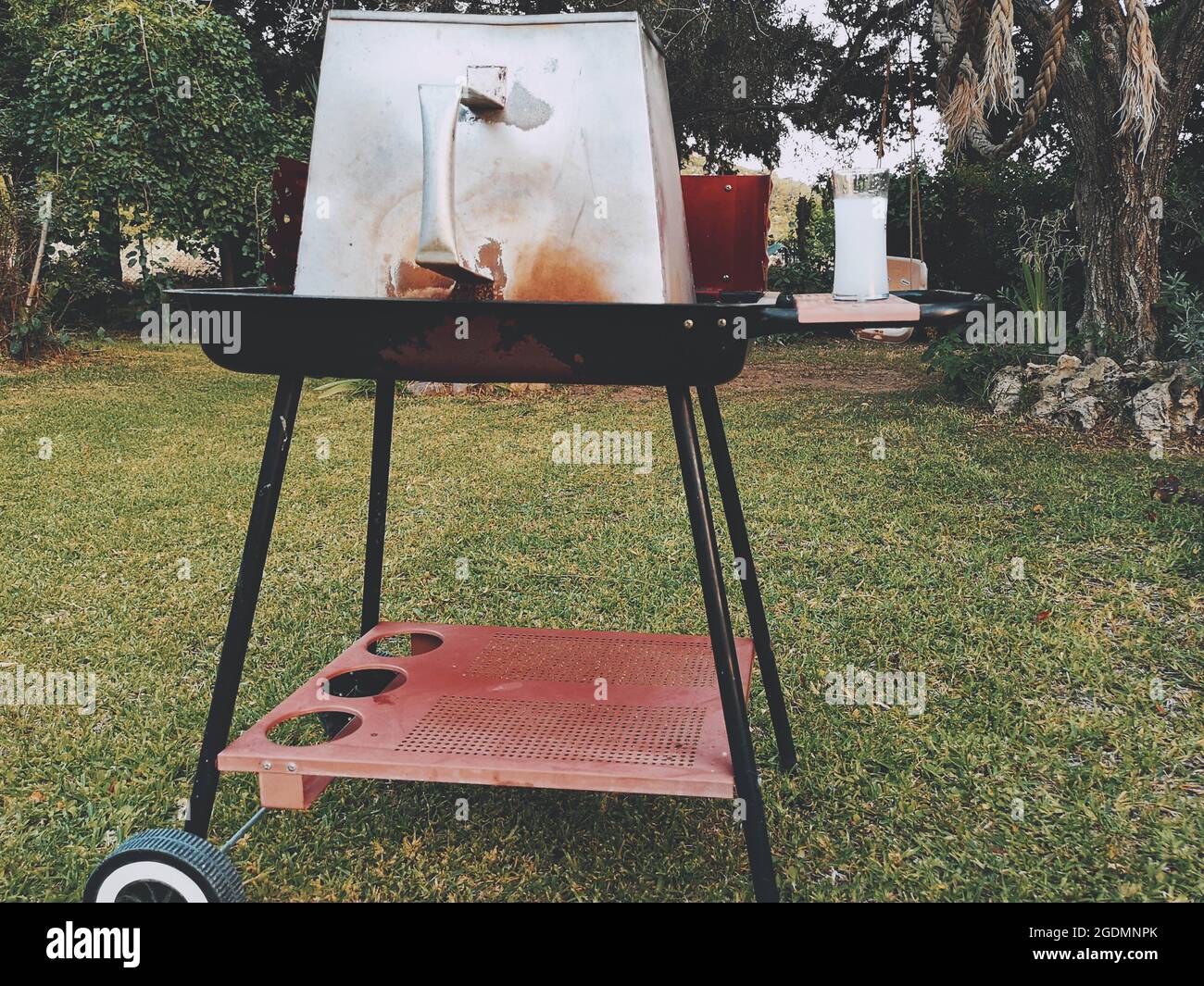 Grilling Barbeque Preparation with Raki Stock Photo