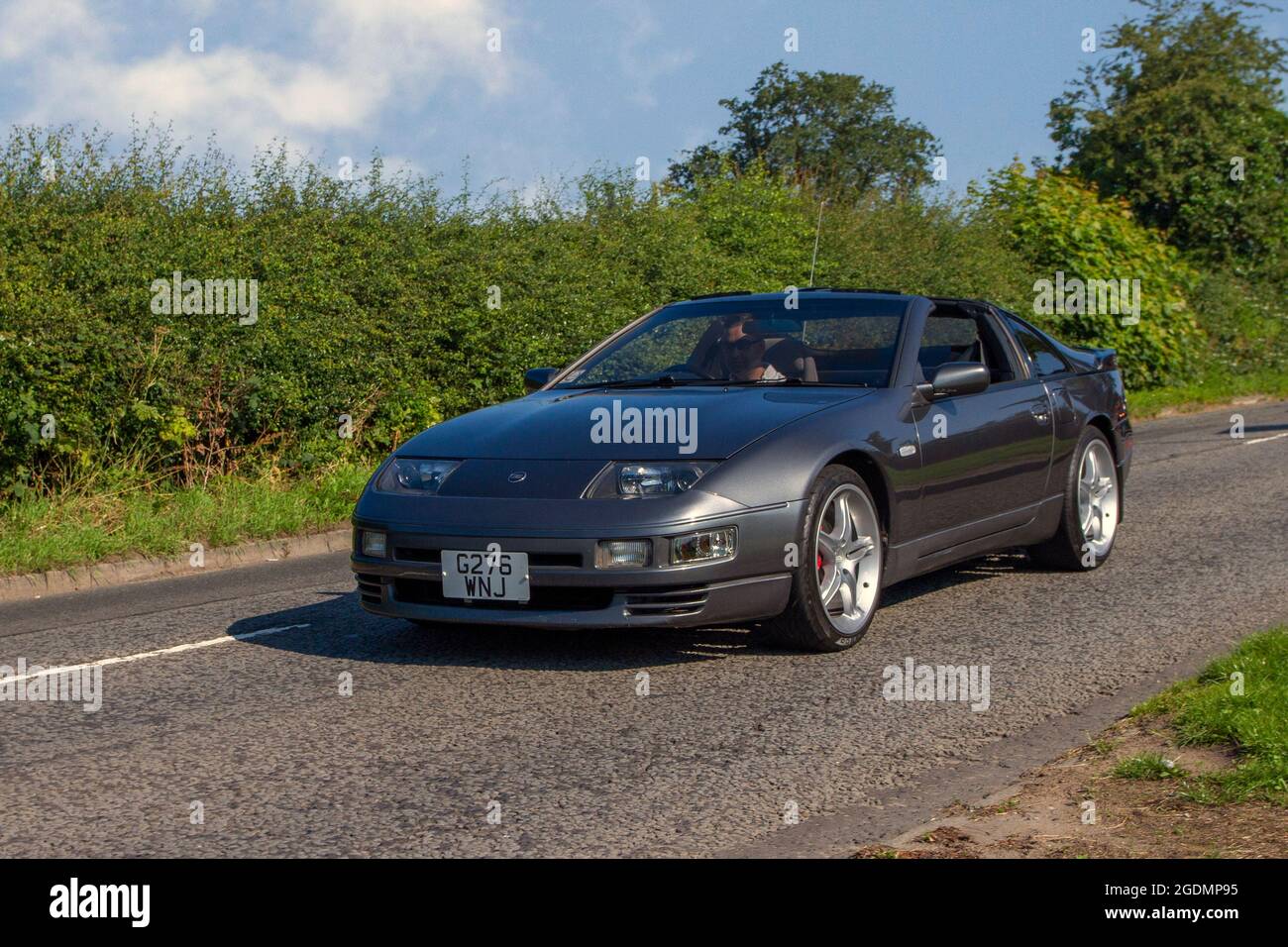 1989 80s grey Nissan 300 ZX 2dr 2998cc petrol coupe en-route to Capesthorne Hall classic July car show, Cheshire, UK Stock Photo