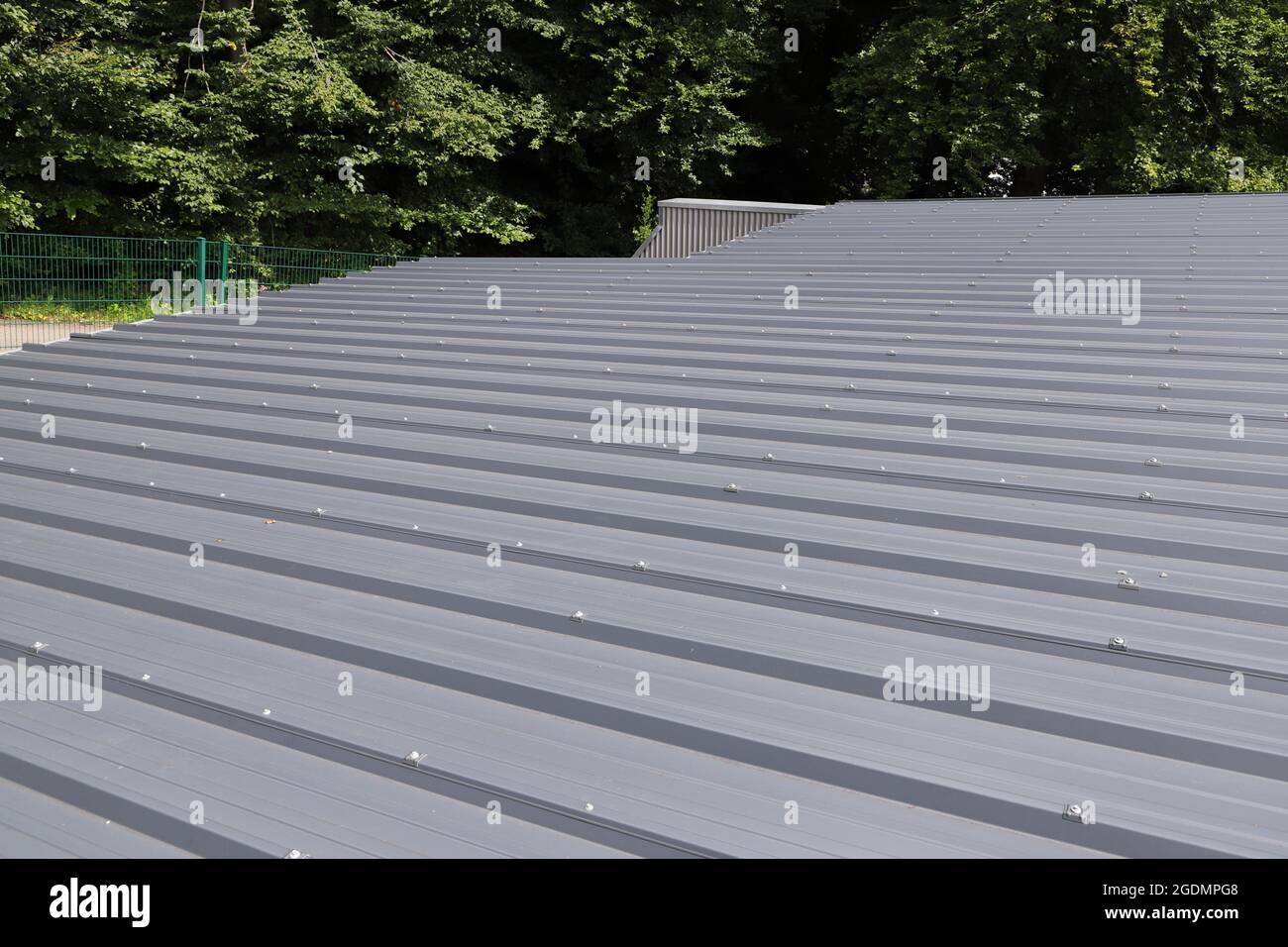 a roof with gray trapezoidal sheet metal Stock Photo - Alamy