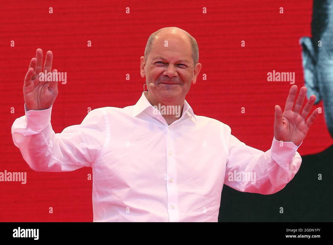Bochum, Germany. 14th Aug, 2021. SPD candidate for chancellor Olaf Scholz speaks at Dr. Rur Platz in Bochum. Scholz starts the hot phase of the election campaign in the Ruhr area. Around six weeks before the federal election, he is speaking in the city centre of Bochum to kick off his tour. Credit: David Young/dpa/Alamy Live News Stock Photo