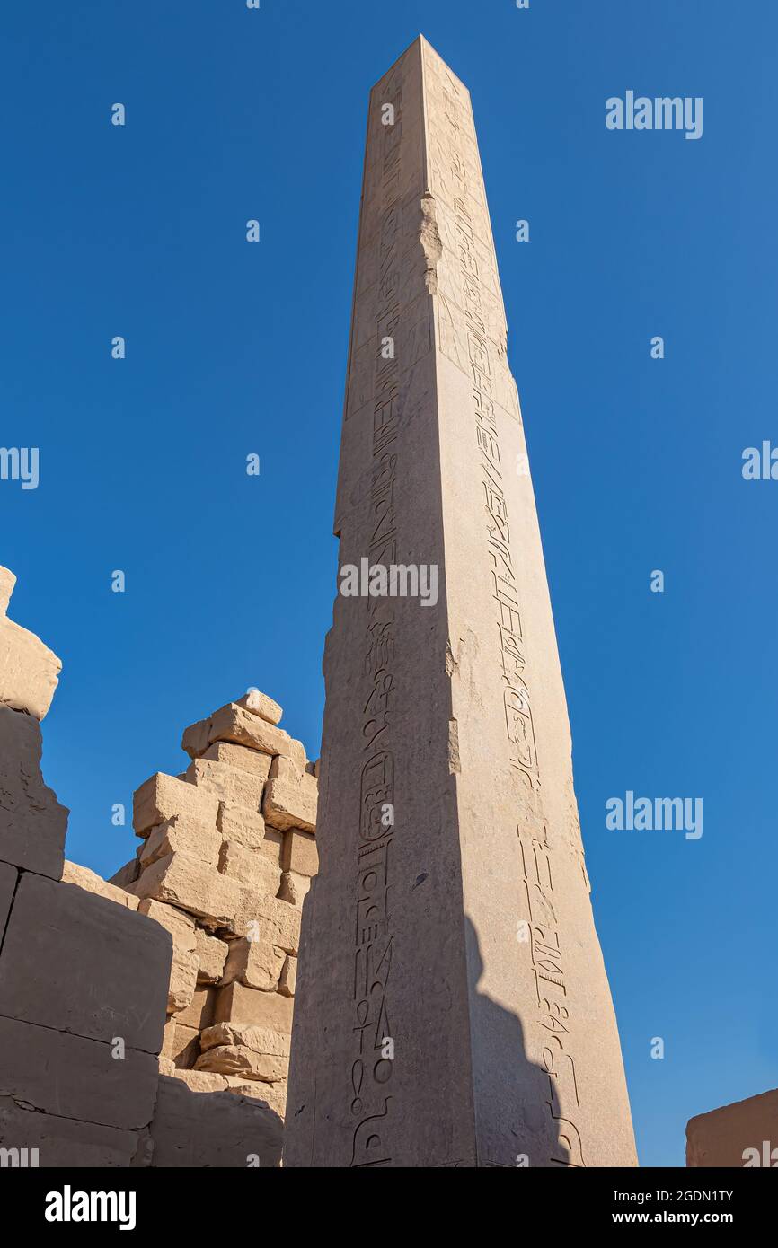 Granite obelisks in Karnak temple. Luxor, Egypt. Commonly known as Karnak, comprises a vast mix of decayed temples, chapels, pylons, and other buildin Stock Photo