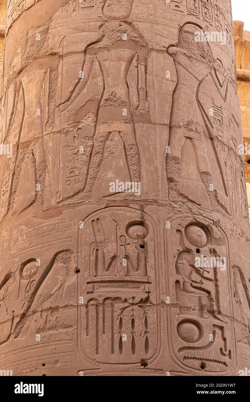 Hieroglyphs in Ruins of the Karnak Temple Complext at Luxor representing the ancient Egyptian god Min Stock Photo