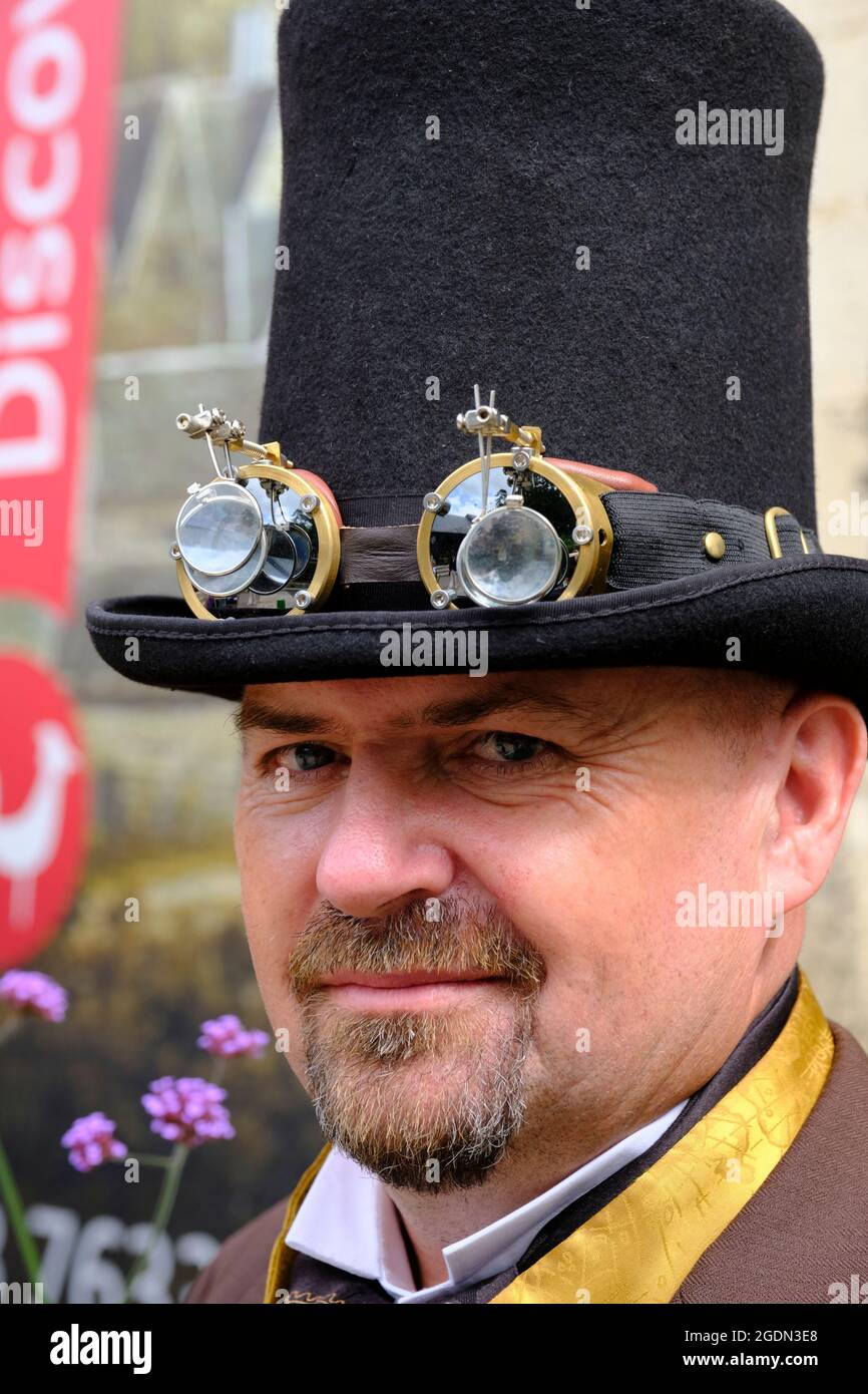 Stroud, Glos, UK. 14th Aug, 2021. All things Steampunk are celebrated today in Stratford Park and the Museum in the Park in Stroud. Steampunk is a sci-fi genre with its roots in H G Wells and Jules Verne, characterised by Victorian Fashion and the desire to escape into a past that has not happened yet. Pictured is Simon Chadwick Stock Photo