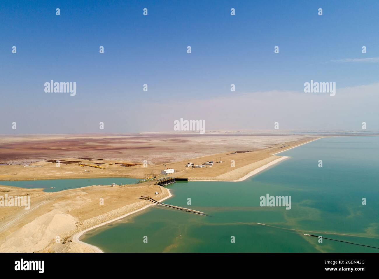 Aerial Photography with a drone. Elevated view of the canal leading water from the northern part to the Dead Sea Works, in the southern part on the sh Stock Photo