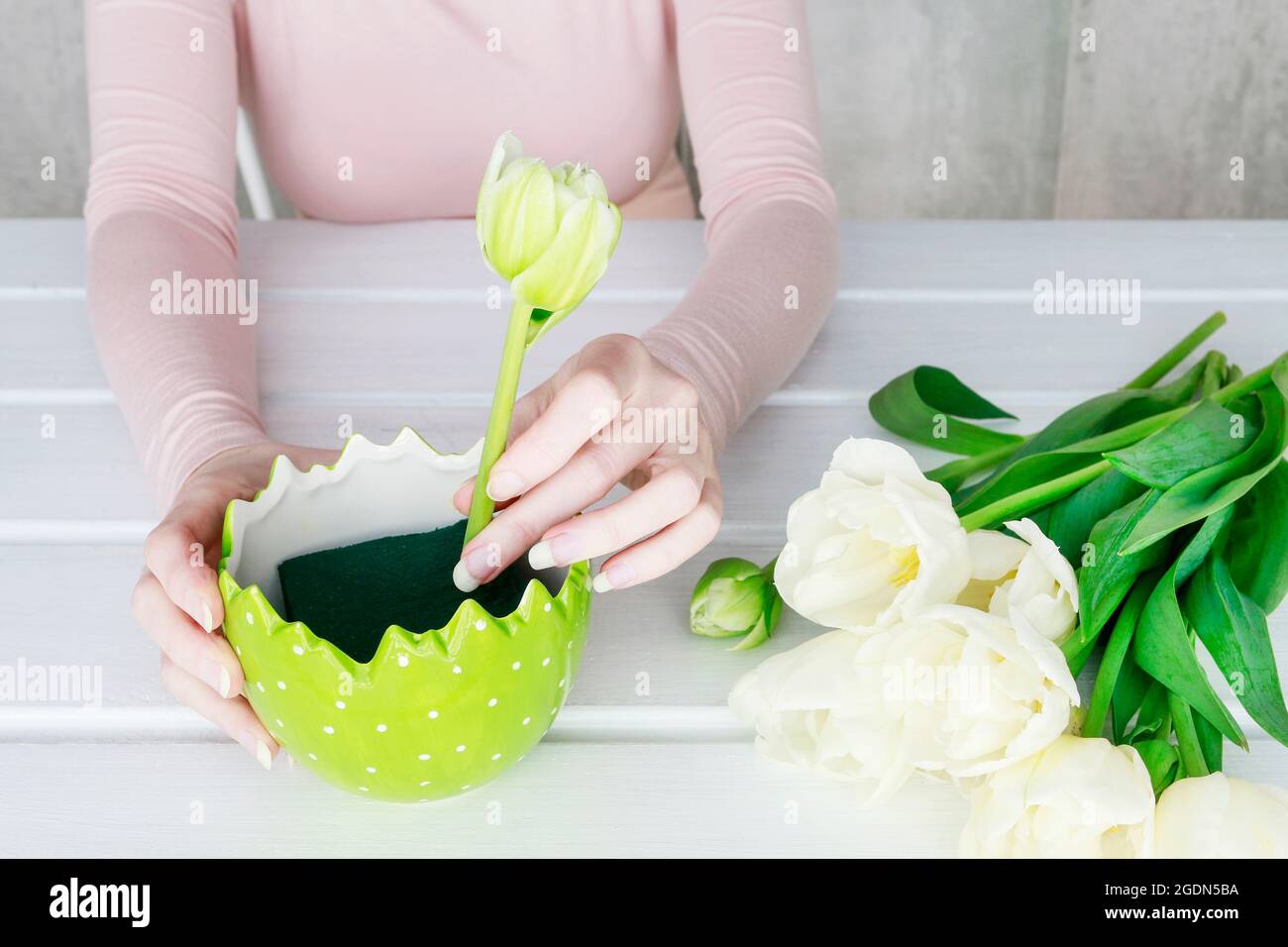 Florist at work How to make beautiful spring floral arrangement with