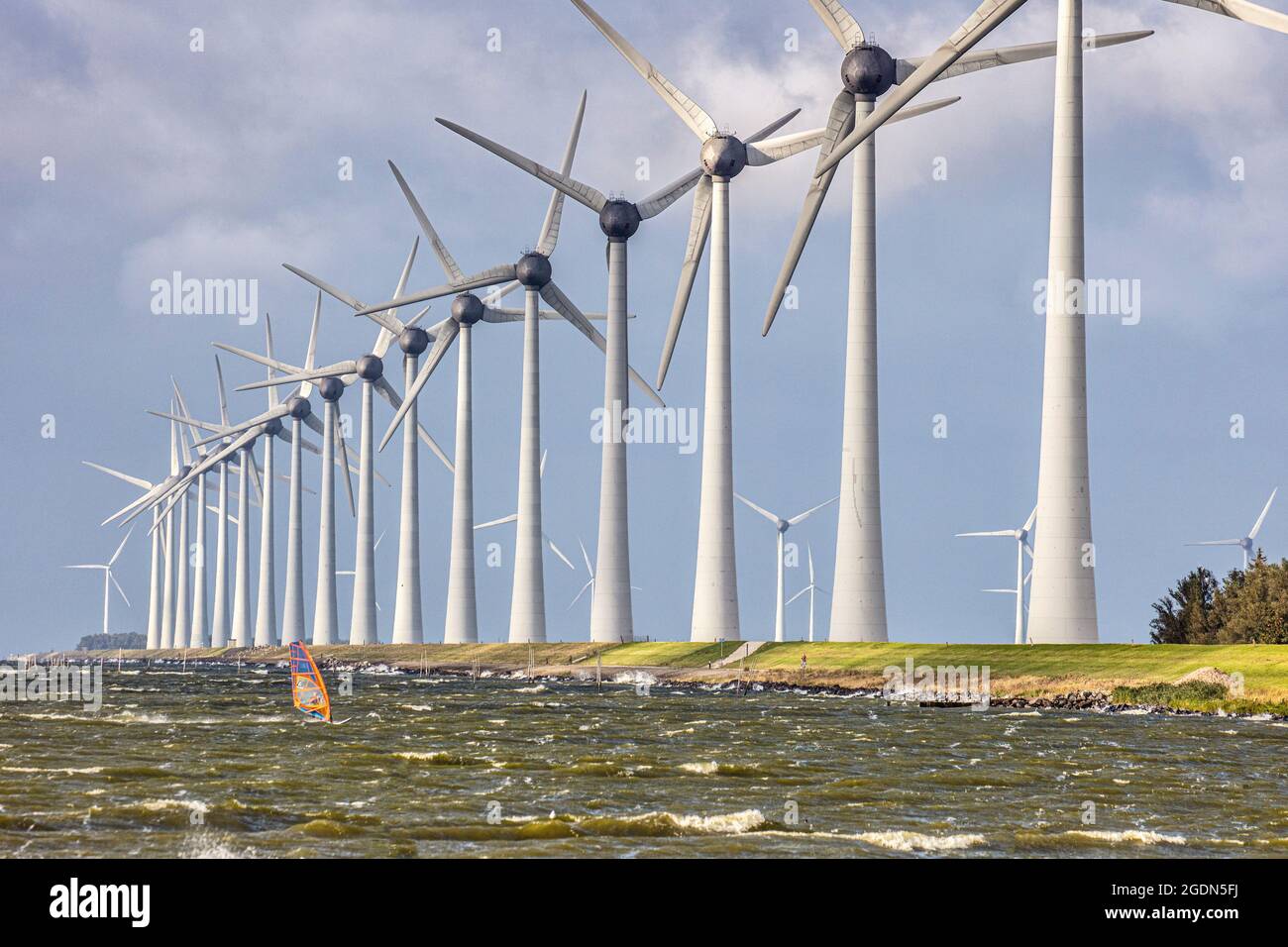 The Netherlands, Urk, Fisher village, which was an island in the Zuiderzee before it became part of the Flevo polder in 1939. Windturbines in the IJss Stock Photo