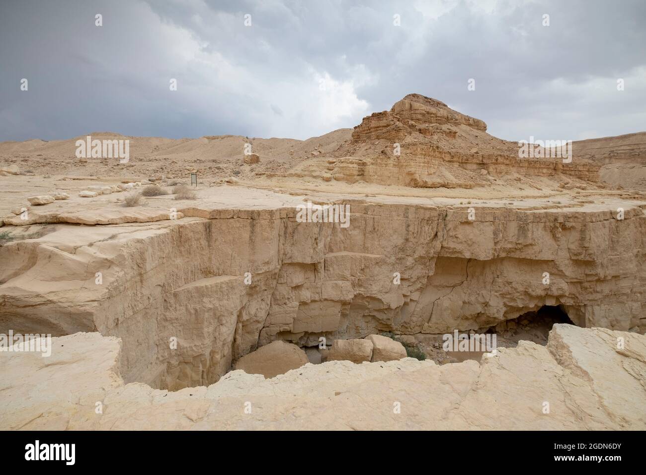 A deep dry river gorge cut in the dry Marl sandstone by flood water. The only water that flows into the Dead Sea, Israel Stock Photo