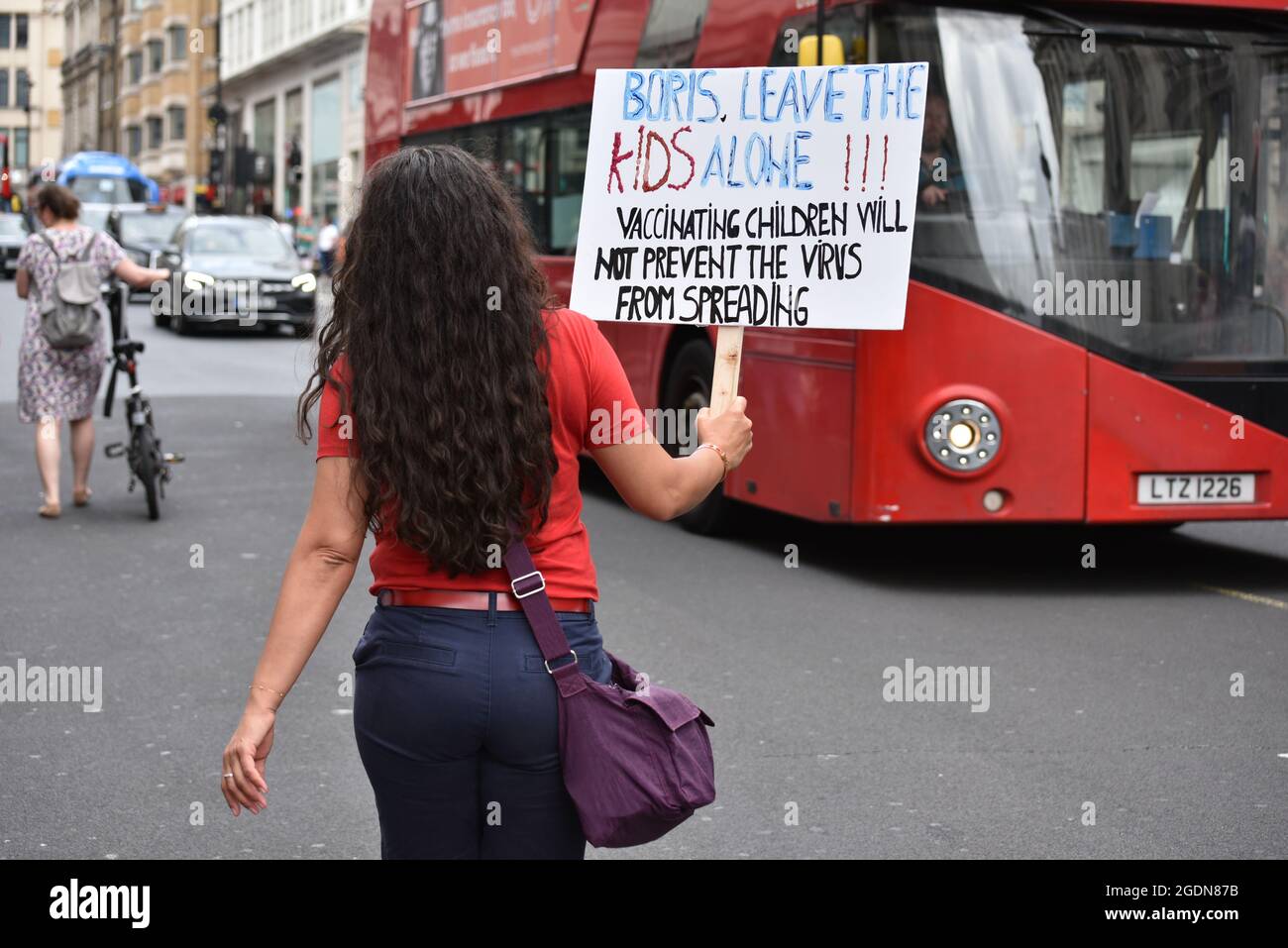 London, UK. 14 August 2021. Protesters march in London against vaccinations, vaccine passports and COVID restrictions. Credit: Andrea Domeniconi/Alamy Live News Stock Photo